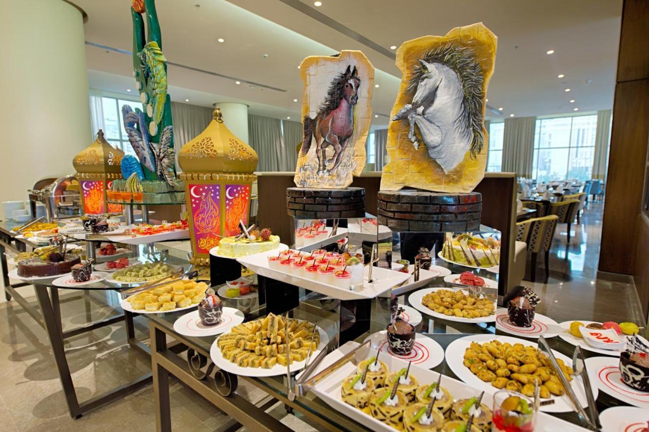 Holiday Suites Al Azizia Mecca Exterior foto A buffet at the Jumeirah Jumeirah Hotel