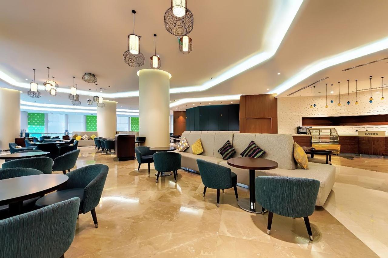 Holiday Suites Al Azizia Mecca Exterior foto The hotel's lobby